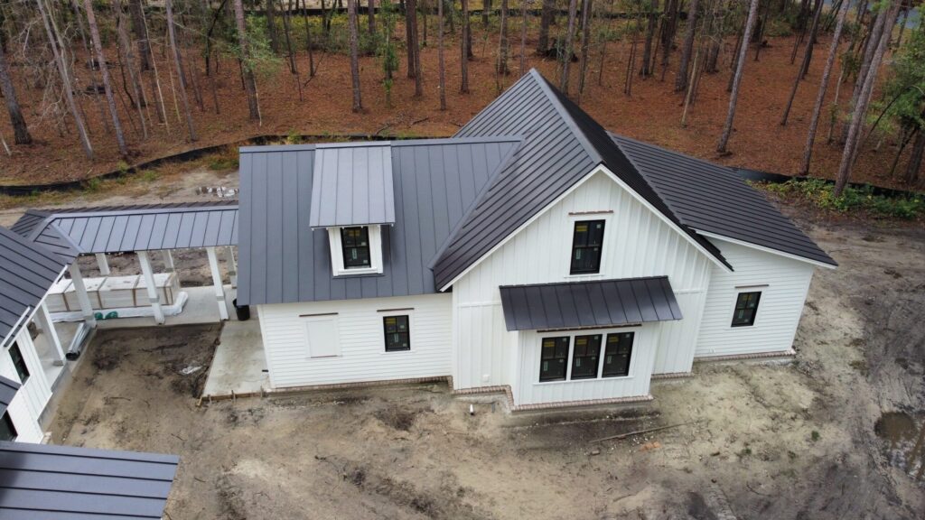 A new, custom, standing seam metal roof, on an almost finished home for an actual Howe Roofs customer.