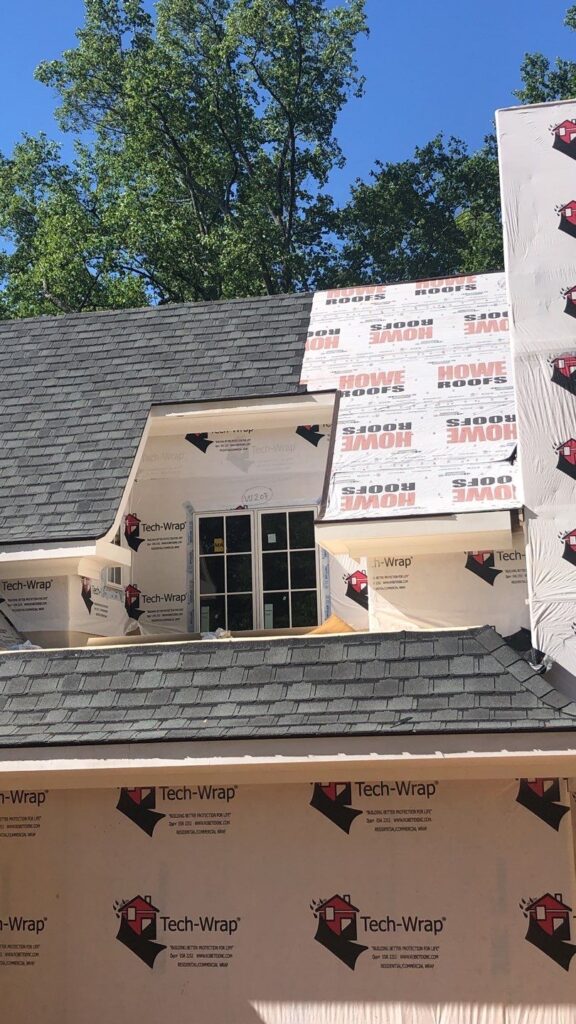 Premium architectural shingle being installed by Howe Roofs.